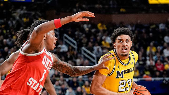 Michigan forward Yaxel Lendeborg (23) goes to the basket against Ohio State forward Amare Bynum (1) during the first half at Crisler Center in Ann Arbor on Friday, Jan. 23, 2026.