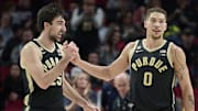 Purdue Boilermakers guard Ethan Morton (25) celebrates with Mason Gillis (0)