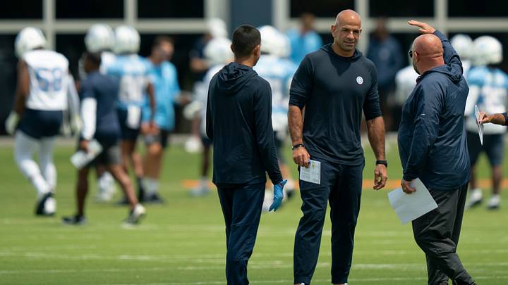 Tennessee Titans Coach Robert Saleh, center, and Offensive Coordinator Brian Daboll, right, talk during warmups on the first day of mandatory minicamp at Vanderbilt Health Football Center, Tenn., Tuesday, June 16, 2026.