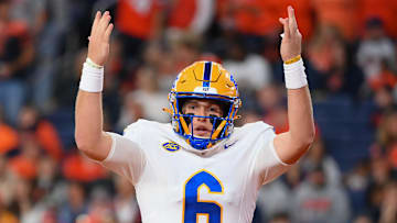 Oct 18, 2025; Syracuse, New York, USA; Pittsburgh Panthers quarterback Mason Heintschel (6) reacts to his touchdown run against the Syracuse Orange during the first half at the JMA Wireless Dome. Mandatory Credit: Rich Barnes-Imagn Images