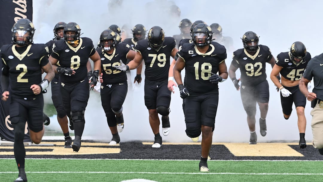 Sep 27, 2025; Winston-Salem, North Carolina, USA;  The Wake Forest Demon Deacons take the field against the Georgia Tech Yellow Jackets at Allegacy Federal Credit Union Stadium. Mandatory Credit: Zachary Taft-Imagn Images