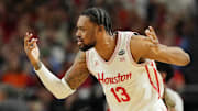 Apr 7, 2025; San Antonio, TX, USA; Houston Cougars forward J'Wan Roberts (13) reacts after a play against the Florida Gators during the second half of the national championship game of the Final Four of the 2025 NCAA Tournament at the Alamodome. Mandatory Credit: Bob Donnan-Imagn Images