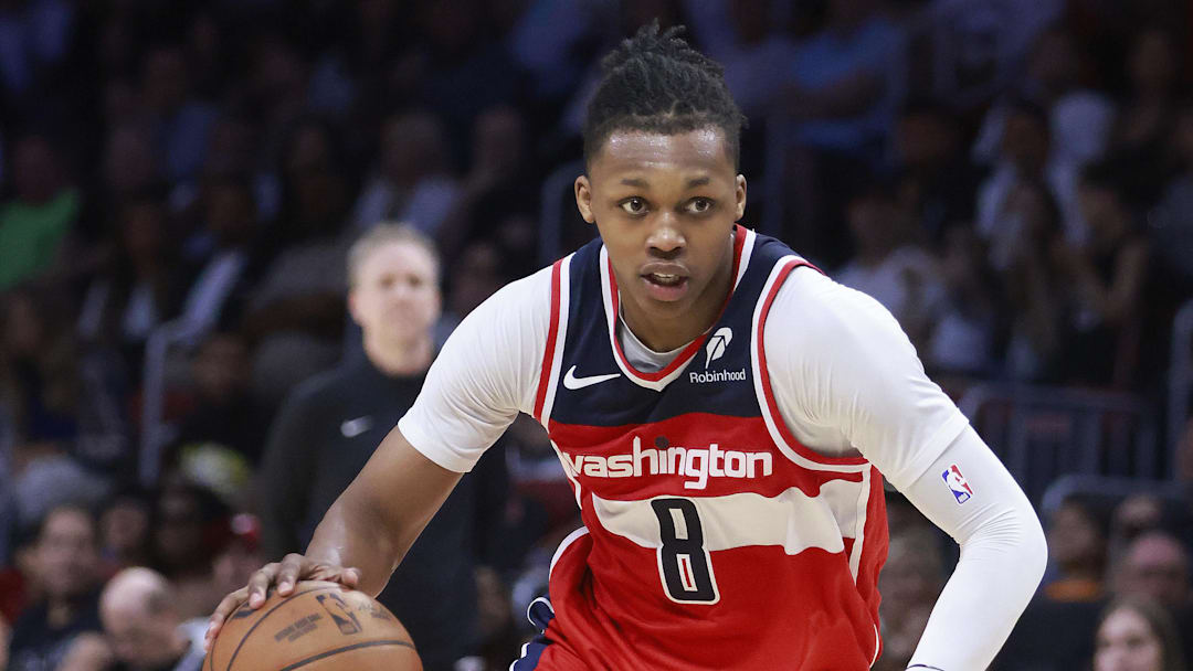 Apr 13, 2025; Miami, Florida, USA;  Washington Wizards guard Bub Carrington (8) drives the ball against the Miami Heat during the second half at Kaseya Center. Mandatory Credit: Rhona Wise-Imagn Images