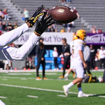 Oct 12, 2024; Amherst, Massachusetts, USA; Missouri Tigers wide receiver James Madison II (4) warms up before a game against the Massachusetts Minutemen at Warren McGuirk Alumni Stadium. Mandatory Credit: Eric Canha-Imagn Images
