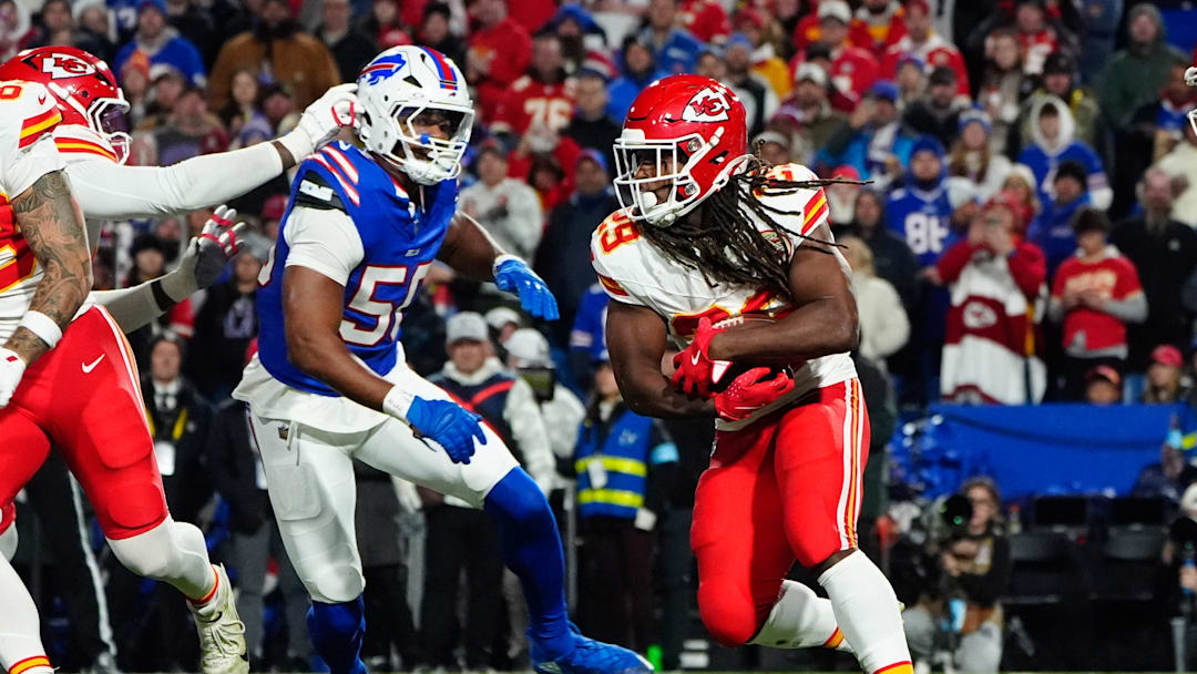 Nov 17, 2024; Orchard Park, New York, USA; Kansas City Chiefs running back Kareem Hunt (29) runs with the ball against the Buffalo Bills during the second half at Highmark Stadium. Mandatory Credit: Gregory Fisher-Imagn Images