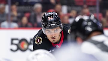 Sep 24, 2024; Ottawa, Ontario, CAN; Ottawa Senato right wing Tyler Boucher (54) lines up for a faceoff in the first period  against the Toronto Maple Leafs at the Canadian Tire Centre. Mandatory Credit: Marc DesRosiers-Imagn Images