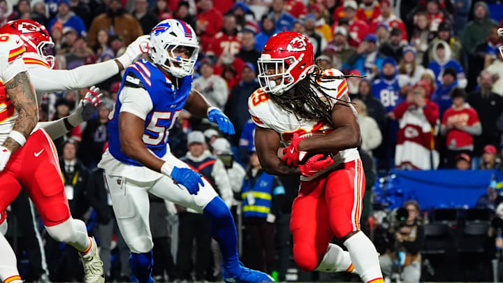 Nov 17, 2024; Orchard Park, New York, USA; Kansas City Chiefs running back Kareem Hunt (29) runs with the ball against the Buffalo Bills during the second half at Highmark Stadium. Mandatory Credit: Gregory Fisher-Imagn Images