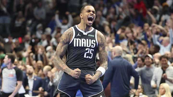 Dallas Mavericks forward P.J. Washington (25) reacts after scoring during the fourth quarter against the Memphis Grizzlies  at American Airlines Center. 