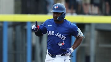 Feb 22, 2025; Dunedin, Florida, USA;  Toronto Blue Jays second base Orelvis Martinez (13) runs the bases after hitting a home run during the fourth inning against the New York Yankees at TD Ballpark. Mandatory Credit: Kim Klement Neitzel-Imagn Images