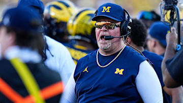 Michigan defensive coordinator Wink Martindale talks to players after a play against USC during the second half at Michigan Stadium in Ann Arbor on Saturday, Sept. 21, 2024.