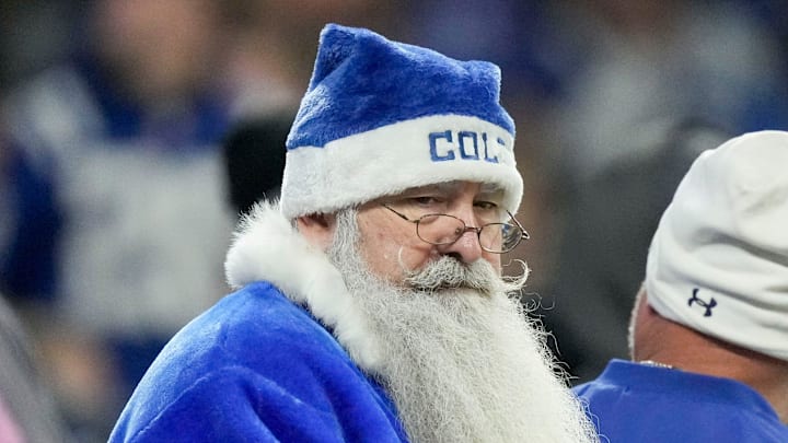 An Indianapolis Colts fan dresses as Santa Claus