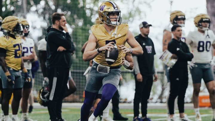 Will Rogers looks for a receiver during spring ball. 