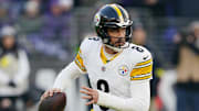 Dec 72025; BaltimoreMarylandUSA; Pittsburgh Steelers quarterback Aaron Rodgers (8) looks to pass the ball against the Baltimore Ravens during the second half at M&T Bank Stadium. Mandatory Credit: Mitch Stringer-Imagn Images