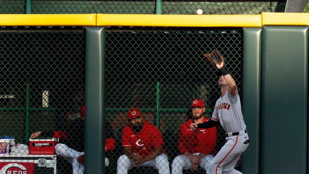San Francisco Giants center fielder Jared Oliva (56) catches a fly ball for an out in the first inning between the Cincinnati Reds and the San Francisco Giants at Great American Ball in Cincinnati on Tuesday, April 14, 2026.