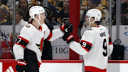 Oct 28, 2023; Pittsburgh, Pennsylvania, USA; Ottawa Senators left wing Brady Tkachuk (7) is congratulated by center Josh Norris (9) after Tkachuk scored a goal against the Pittsburgh Penguins during the first period at PPG Paints Arena. Mandatory Credit: Charles LeClaire-Imagn Images