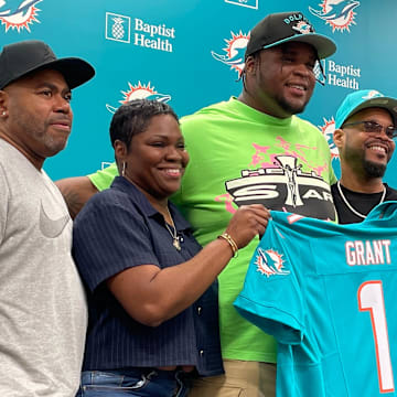 Miami Dolphins first-round pick Kenneth Grant with his family on Friday, April 25, 2025, in Miami Gardens.