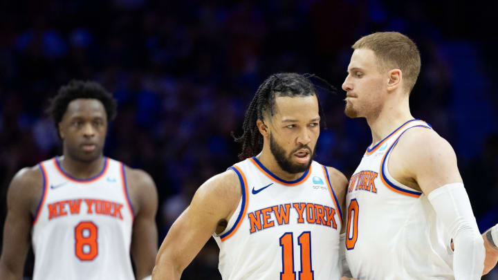 May 2, 2024; Philadelphia, Pennsylvania, USA; New York Knicks guard Jalen Brunson (11) reacts with guard Donte DiVincenzo (0) after scoring against the Philadelphia 76ers during the second half of game six of the first round for the 2024 NBA playoffs at Wells Fargo Center. Mandatory Credit: Bill Streicher-USA TODAY Sports