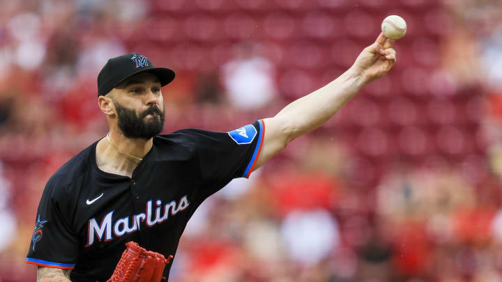 Jul 14, 2024; Cincinnati, Ohio, USA; Miami Marlins relief pitcher Tanner Scott (66) pitches against the Cincinnati Reds in the ninth inning at Great American Ball Park. 