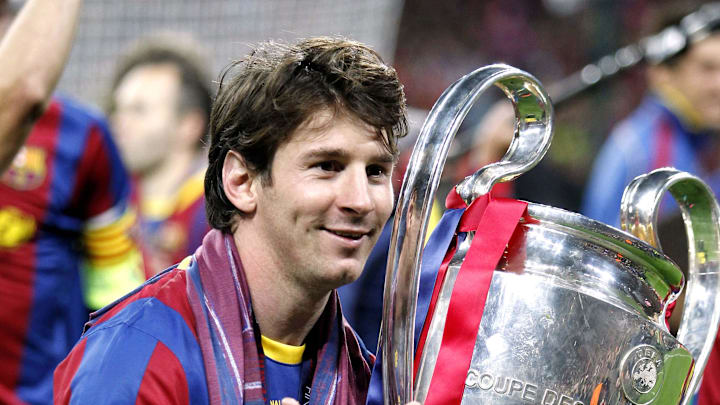 FC Barcelona's Lionel Messi celebrates after defeating Manchester United 3-1 in the 2011 UEFA Champions League final.