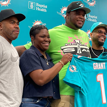 Miami Dolphins first-round pick Kenneth Grant with his family on Friday, April 25, 2025, in Miami Gardens.