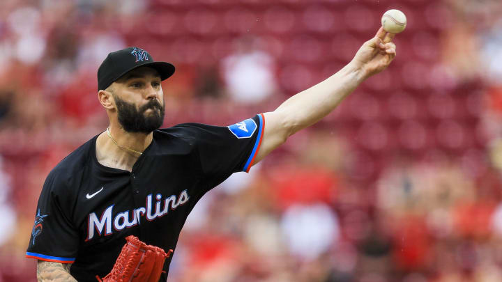 Jul 14, 2024; Cincinnati, Ohio, USA; Miami Marlins relief pitcher Tanner Scott (66) pitches against the Cincinnati Reds in the ninth inning at Great American Ball Park.