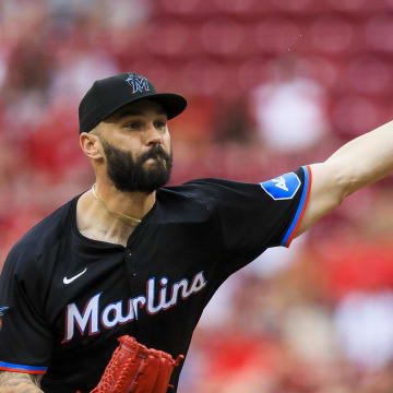 Jul 14, 2024; Cincinnati, Ohio, USA; Miami Marlins relief pitcher Tanner Scott (66) pitches against the Cincinnati Reds in the ninth inning at Great American Ball Park. Mandatory Credit: Katie Stratman-USA TODAY Sports
