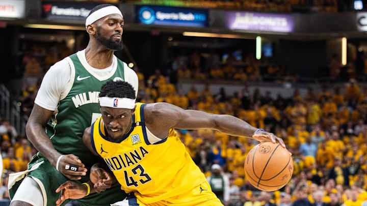 Indiana Pacers forward Pascal Siakam (43) dribbles the ball while Milwaukee Bucks forward Bobby Portis (9) defends during game six of the first round for the 2024 NBA playoffs at Gainbridge Fieldhouse.