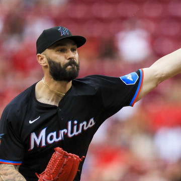 Jul 14, 2024; Cincinnati, Ohio, USA; Miami Marlins relief pitcher Tanner Scott (66) pitches against the Cincinnati Reds in the ninth inning at Great American Ball Park.