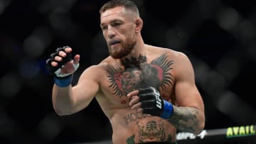 Jul 10, 2021; Las Vegas, Nevada, USA; Conor McGregor fights Dustin Poirier during UFC 264 at T-Mobile Arena. Mandatory Credit: Gary A. Vasquez-USA TODAY Sports