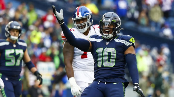 Oct 30, 2022; Seattle, Washington, USA; Seattle Seahawks linebacker Uchenna Nwosu (10) celebrates following a sack against the New York Giants during the fourth quarter at Lumen Field.