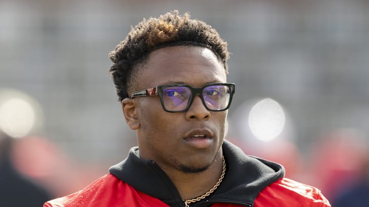 Cornerback Colton Hood of Tennessee walks the field