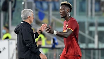 Jose Mourinho coach of AS Roma greets Tammy Abraham during...