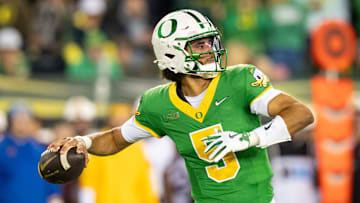 Oregon quarterback Dante Moore looks to pass as the Oregon Ducks host the Minnesota Golden Gophers on Nov. 14, 2025, at Autzen Stadium in Eugene, Oregon.