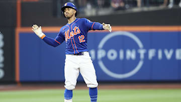 Jun 26, 2024; New York City, New York, USA;  New York Mets shortstop Francisco Lindor (12) celebrates after hitting a double in the third inning against the New York Yankees at Citi Field. Mandatory Credit: Wendell Cruz-USA TODAY Sports
