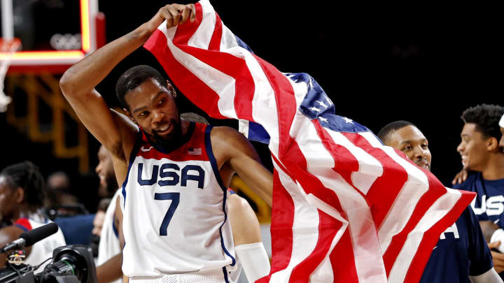 Aug 7, 2021; Saitama, Japan; United States forward Kevin Durant (7) celebrates winning the gold medal against France in the men's basketball gold medal game during the Tokyo 2020 Olympic Summer Games at Saitama Super Arena. Mandatory Credit: Geoff Burke-USA TODAY Sports