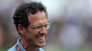 Cleveland Browns chief strategy officer Paul DePodesta laughs on the sideline before an NFL preseason football game at Cleveland Browns Stadium, Saturday, Aug. 17, 2024, in Cleveland, Ohio.