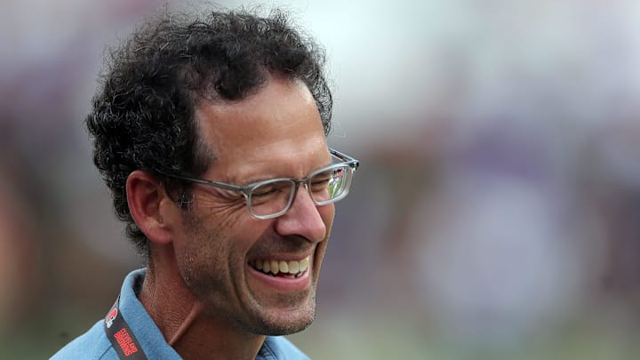 Cleveland Browns chief strategy officer Paul DePodesta laughs on the sideline before an NFL preseason football game at Cleveland Browns Stadium, Saturday, Aug. 17, 2024, in Cleveland, Ohio.