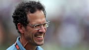 New Colorado Rockies president of baseball operations Paul DePodesta smiles during a workout.