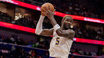 Nov 14, 2025; New Orleans, Louisiana, USA;  Los Angeles Lakers center Deandre Ayton (5) grabs a rebound against the New Orleans Pelicans during the second half at Smoothie King Center. Mandatory Credit: Stephen Lew-Imagn Images