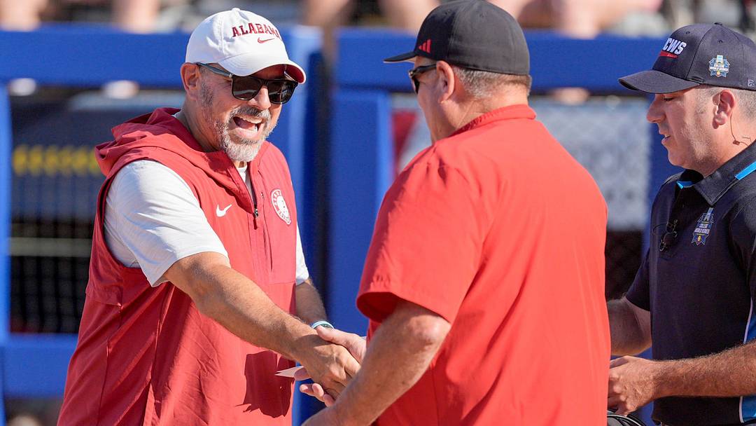 Texas Tech head coach Gerry Glasco and Alabama head coach Patrick Murphy shake hands before a softball game at the Women’s College World Series between Texas Tech and Alabama at Devon Park in Oklahoma City, on Monday, June 1, 2026.