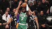Apr 23, 2022; Brooklyn, New York, USA;  Brooklyn Nets guard Patty Mills (8) forces a tie up against Boston Celtics guard Jaylen Brown (7) in the second quarter at Barclays Center. Mandatory Credit: Wendell Cruz-Imagn Images