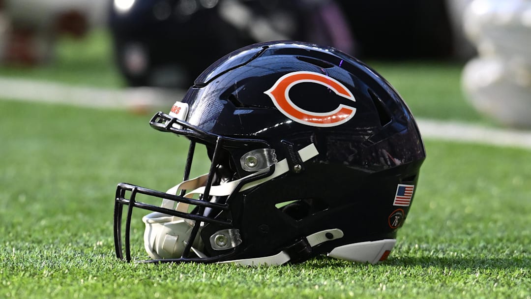 A Chicago Bears helmet sits on the field prior to a game.
