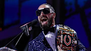 Apr 25, 2025; Green Bay, WI, USA; FWWE wrestler and Chicago Bears fan Seth Rollins taunts the crowd before announcing the team’s selection with the 56th overall pick during the second round of the 2025 NFL Draft at Lambeau Field. Mandatory Credit: Tork Mason/USA Today Network via Imagn Images