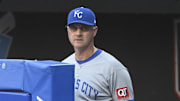 Sep 10, 2025; Cleveland, Ohio, USA; Kansas City Royals manager Matt Quatraro (33) looks on from the dugout in the second inning against the Cleveland Guardians at Progressive Field. Mandatory Credit: David Richard-Imagn Images