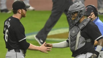 Jul 3, 2024; Cleveland, Ohio, USA; Chicago White Sox relief pitcher Steven Wilson (36) and catcher Martin Maldonado (15) celebrate a win over the Cleveland Guardians at Progressive Field. 