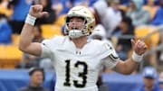 Nov 15, 2025; Pittsburgh, Pennsylvania, USA;  Notre Dame Fighting Irish quarterback CJ Carr (13) calls an audible at the line of scrimmage against the Pittsburgh Panthers during the fourth quarter at Acrisure Stadium. Mandatory Credit: Charles LeClaire-Imagn Images