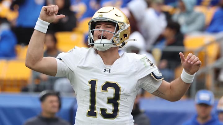 Nov 15, 2025; Pittsburgh, Pennsylvania, USA;  Notre Dame Fighting Irish quarterback CJ Carr (13) calls an audible at the line of scrimmage against the Pittsburgh Panthers during the fourth quarter at Acrisure Stadium. Mandatory Credit: Charles LeClaire-Imagn Images