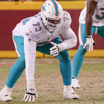 Miami Dolphins tackle Austin Jackson (73) at the line of scrimmage against the Kansas City Chiefs in a 2024 AFC wild card game at GEHA Field at Arrowhead Stadium.
