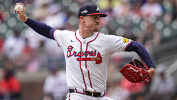 Jun 5, 2025; Cumberland, Georgia, USA; Atlanta Braves relief pitcher Scott Blewett (63) pitches against the Arizona Diamondbacks during the ninth inning at Truist Park.