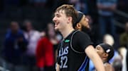 Nov 16, 2025; Dallas, Texas, USA; Dallas Mavericks forward Cooper Flagg (32) celebrates with teammates against the Portland Trail Blazers in overtime at American Airlines Center. Mandatory Credit: Kevin Jairaj-Imagn Images